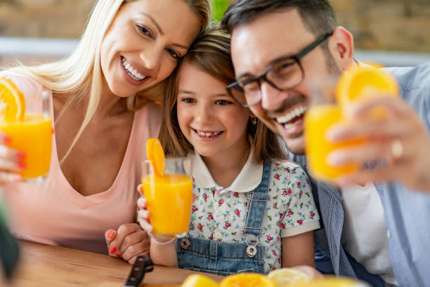 istock Happy family in kitchen 1307250390
