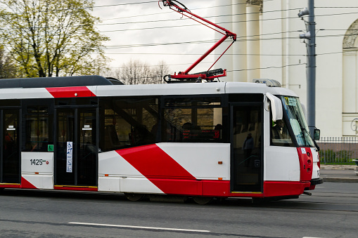 Saint Petersburg, Russia - 4 May 2019. White red modern tram on city street