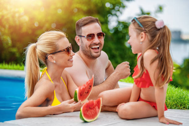 istock Happy young family enjoying on vacation 1307252895