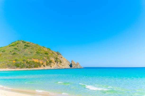 istock Blue sky over Cala Monte Turno shore 1307254758