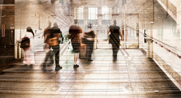 Shot of unrecognizable people walking superimposed over a railroad station staircase. The city is Chicago.