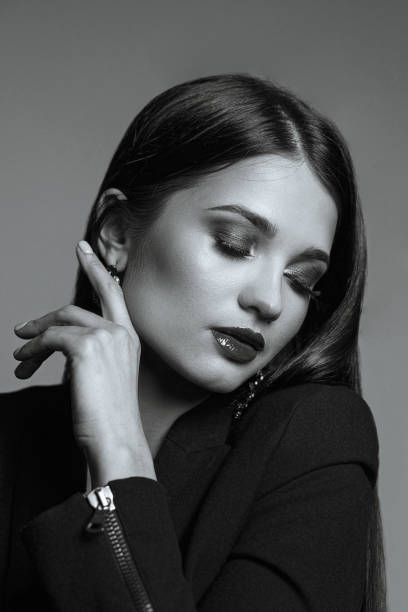 istock Tender model with shiny hair and red lips 1307257041