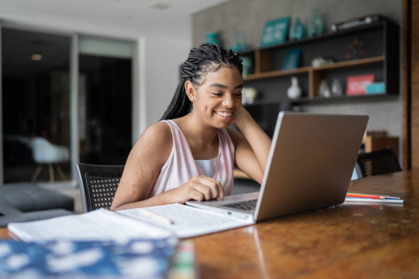 Teenager girl during homeschooling Teenager girl during homeschooling homework stock pictures, royalty-free photos & images