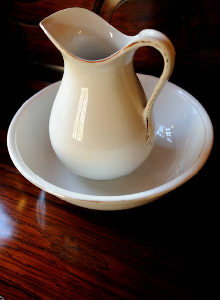 istock Old white ceramic hand wash basin and water pitcher 1307258372