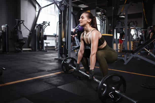 istock Athletic woman working out at the gym 1307259794