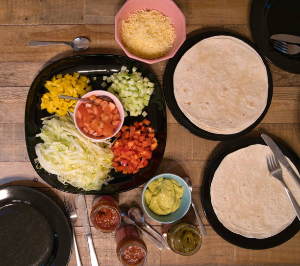 istock Homemade tacos placed on the table 1307261590
