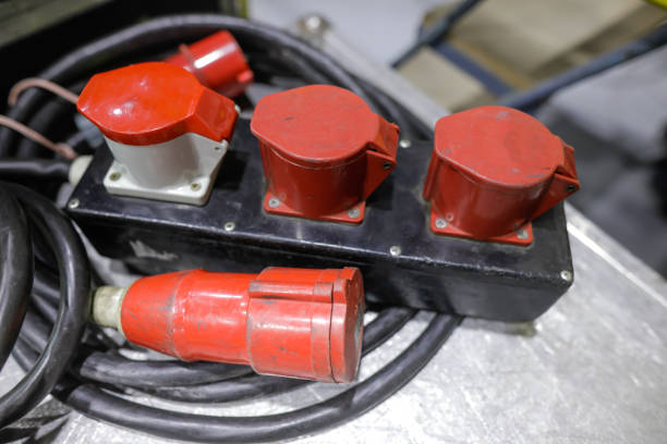 istock Shallow depth of field (selective focus) image with industrial and multiphase electrical plugs and sockets. 1307263822