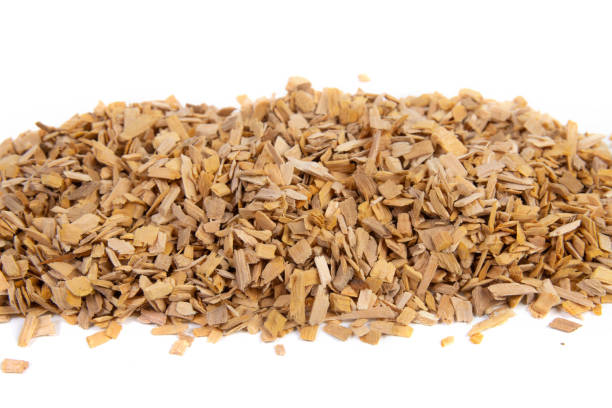istock wood chips for smoking meat and fish on white background 1307265248