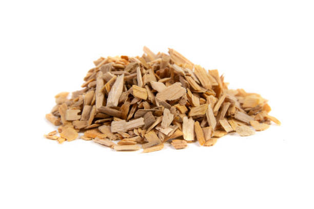 istock wood chips for smoking meat and fish on white background 1307265262