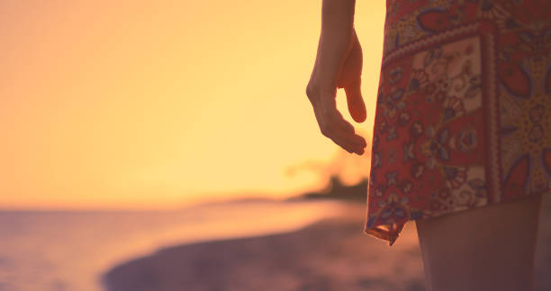 istock Woman at sunset 1307265429