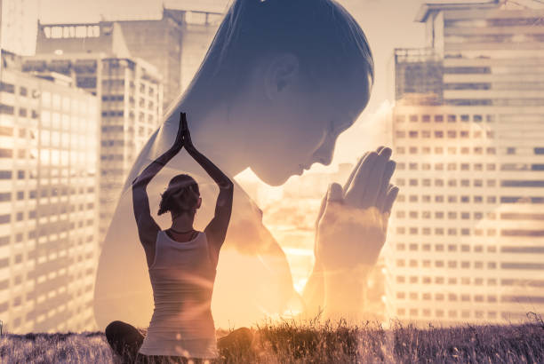 istock Woman meditating. Taking break from a stressful job. 1307265460