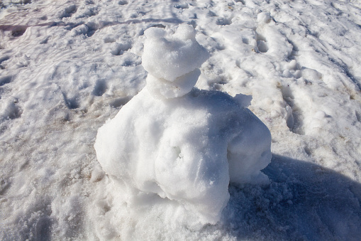 Snowman made in a snowy day