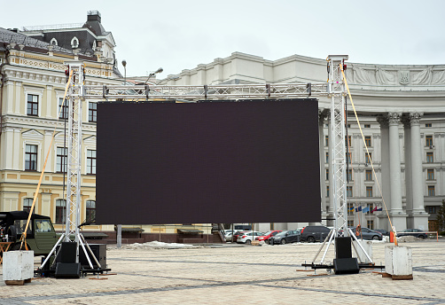 Big led panel screen standing outdoor on city street Kiev Advertisment mock up concept monitor