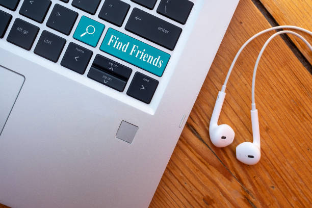 istock Concept for finding online friends with highlighted key and magnifying glass. 1307274430