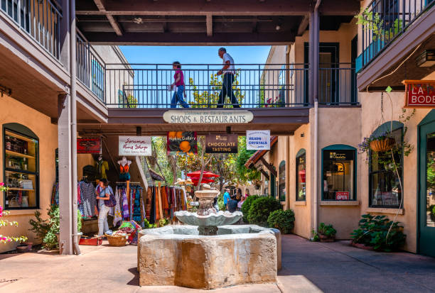 The courtyard of El Paseo de Sonoma, in California. Sonoma, CA  USA - July 15 2015: The courtyard of El Paseo de Sonoma, a shopping centre on First street Napa, with various shops, located off the historic plaza. sonoma county stock pictures, royalty-free photos & images