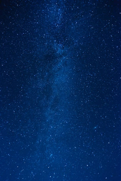 istock Vertical photo of milky way constellation, astrophotography 1307277021