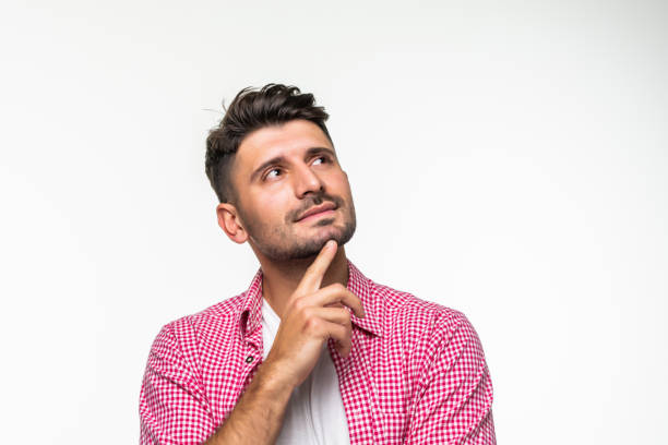 istock young handsome man doubting isolated over white background 1307278414