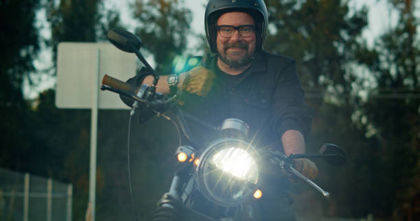 istock Motorcyclist Gives Thumbs Up 1307283133