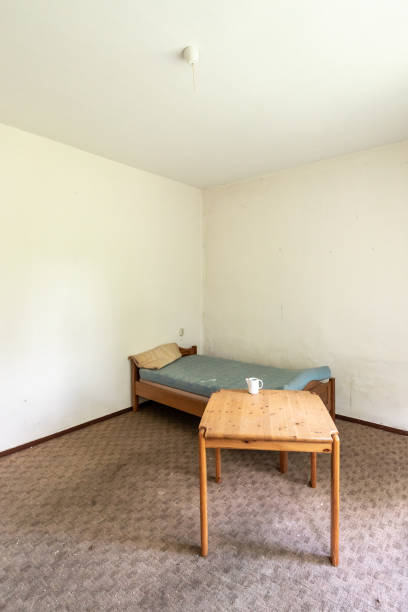 istock Bald empty room in an abandoned hotel 1307283398