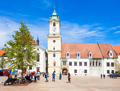 June 21, 2023: Bratislava, Slovaka - A street scene in the old town. The photo contains some people, local businesses, and both local and tourist activity in the streets.