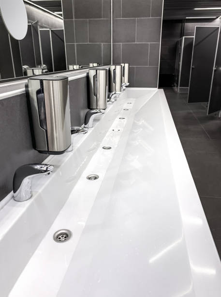 istock Wash basin in public restroom 1307284422