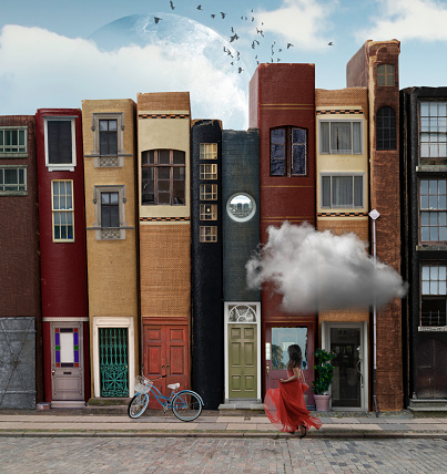 A woman in a red dress with a cloud overhead strolls down a city street with books instead of buildings