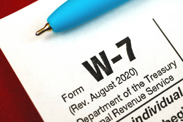 istock Form W-7 close up, W-7 tax form for non-US citizens 1307286546