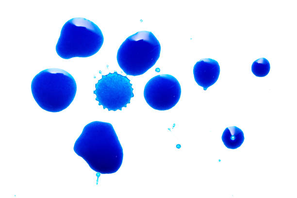 istock Abstract ink splashes or drop isolated on white background. Blue watercolor splashes isolated 1307286754
