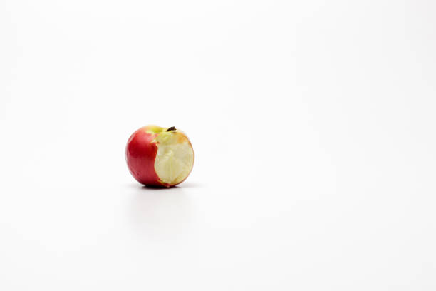 istock A ripe red apple isolated on a white background. Red bitten apple on white background. Apple Clipping Path 1307288098