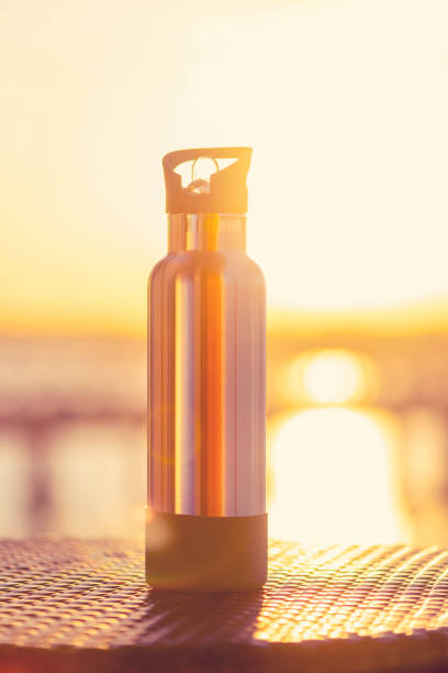 istock Metal reusable water bottle in the sunshine. 1307290491