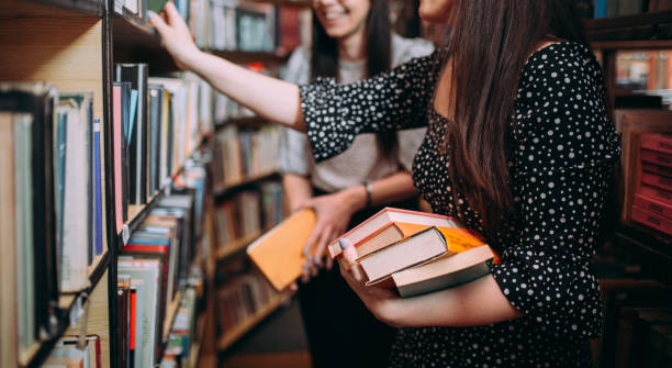 istock Two Young Women Friends Sharing Happy Time Together 1307291316