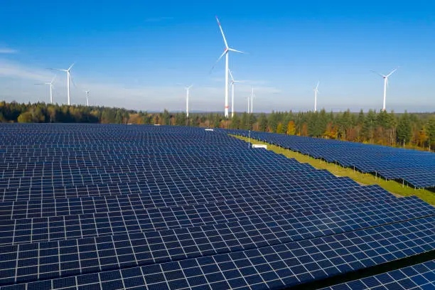 Photo of Solar Panels and Wind Turbines