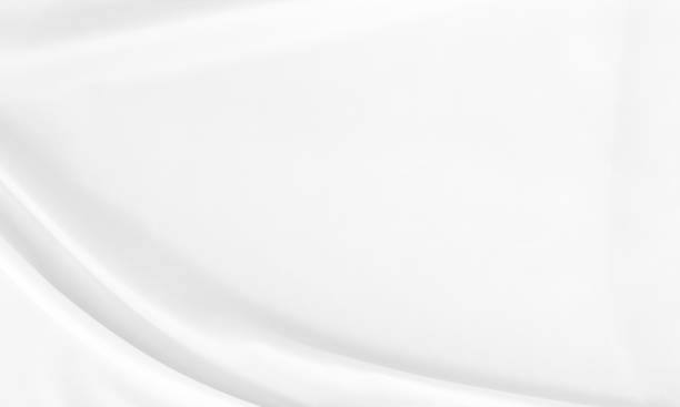 istock White gray satin texture that is white silver fabric silk background with beautiful soft blur pattern natural. 1307296185