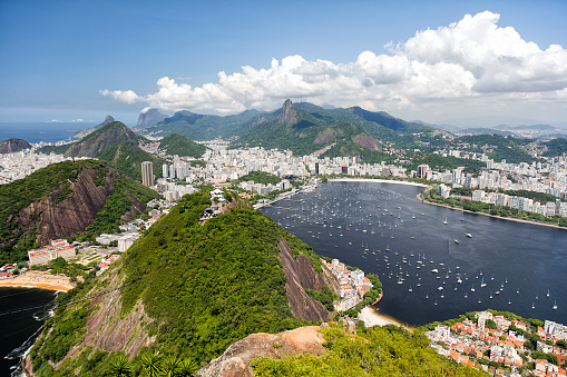 Panoramic view of Rio de Janeiro City from Corcovado hill. View of Guanabara Bay, the sugarloaf, and the Botafogo neighborhood.
