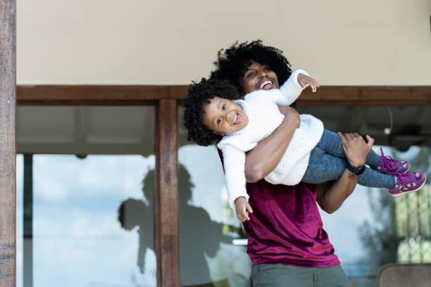istock Young father playing with his daughter 1307297351