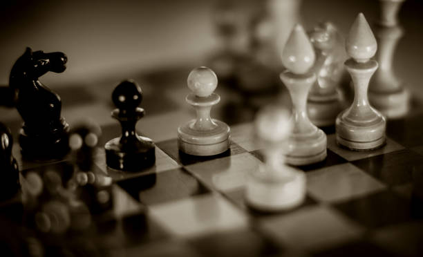 istock Wooden chess pieces on the chessboard. Intellectual game -chess. 1307298204