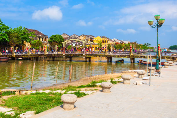 Hoi An ancient town riverfront Fishing boats at the riverfront of Hoi An ancient town in Quang Nam Province of Vietnam dong stock pictures, royalty-free photos & images