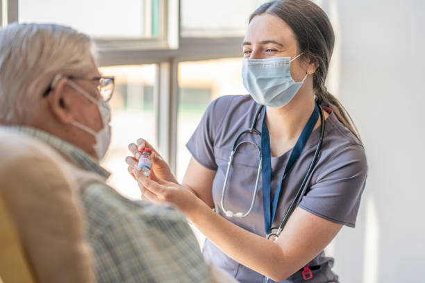 istock Senior getting the Covid-19 Vaccine 1307304090