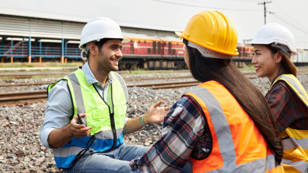 istock A group of railway engineers discussing work outdoors on the tracks. 1307307610