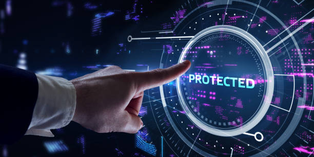 istock Cyber security data protection business technology privacy concept. Young businessman  select the  Protected on the virtual display. 1307309031