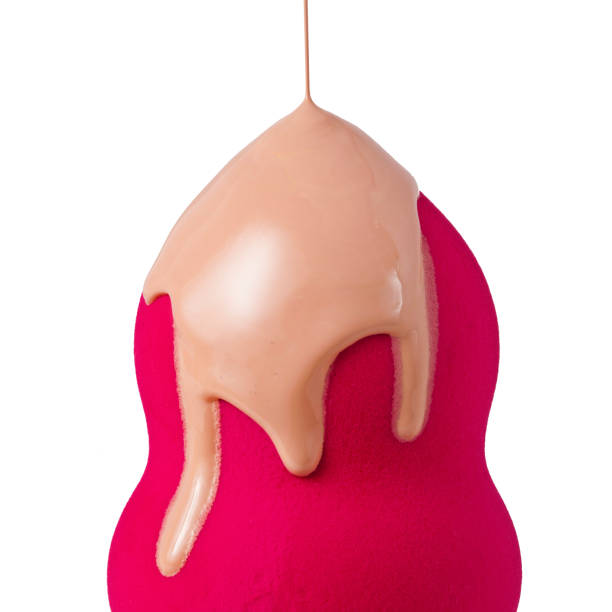 istock Liquid foundation flows onto the pink sponge 1307311167