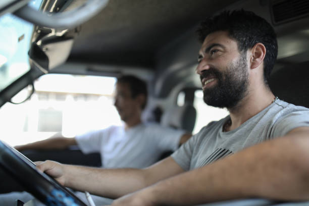 two man travelling with van