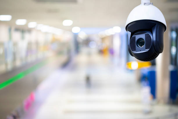 istock Closed-circuit television,Security CCTV camera or surveillance system in background of Checkpoint - Body and bag Luggage Scan Machine 1307314559