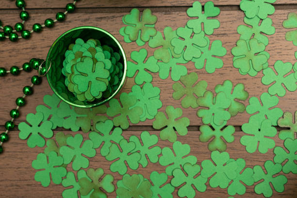 istock Little green cup full of clovers 1307320884