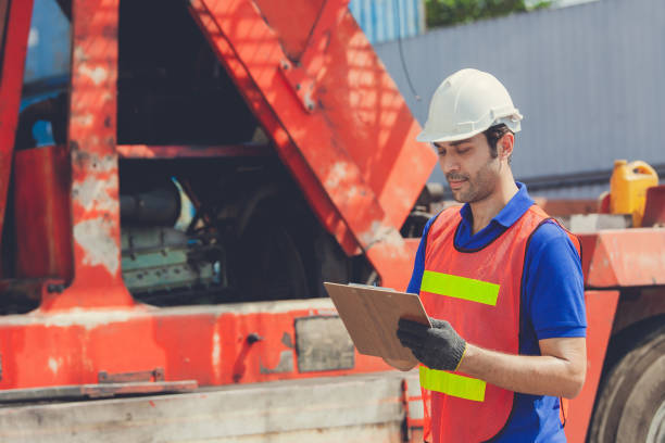 istock Foreman of container inspection workers prepare export products. Container Shipping Logistics Engineering of Import Export Transportation Industry 1307321940