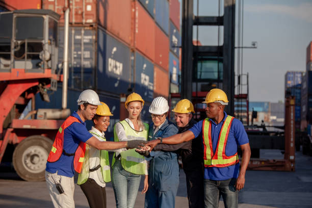 istock Workers Join Hand for Collaboration in the container yard. Business logistic concept, Import and export concept. Workers hands touching and Join Hand for Collaboration for successfully 1307324266
