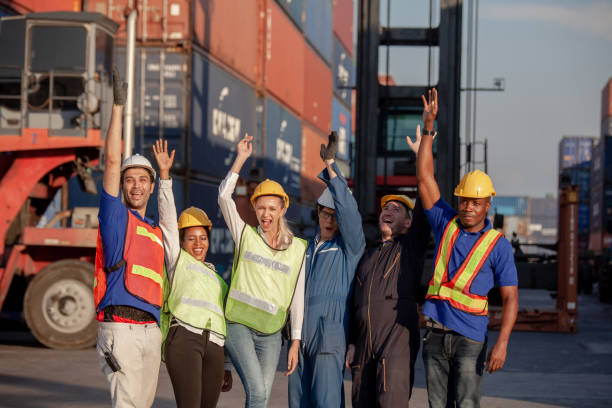 istock Workers Join Hand for Collaboration in the container yard. Business logistic concept, Import and export concept. Workers hands touching and Join Hand for Collaboration for successfully 1307324292