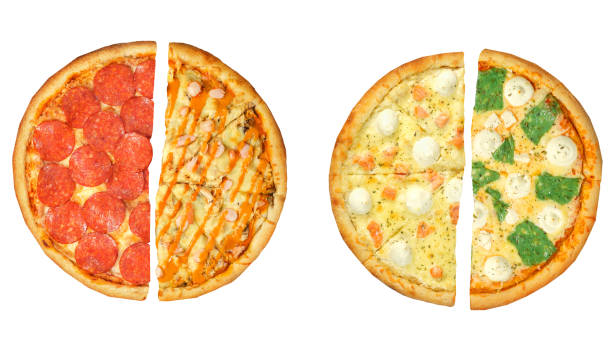 istock Two pizzas, four halves isolated on a white background. Versus concept. Appetizing pizza. 1307327980