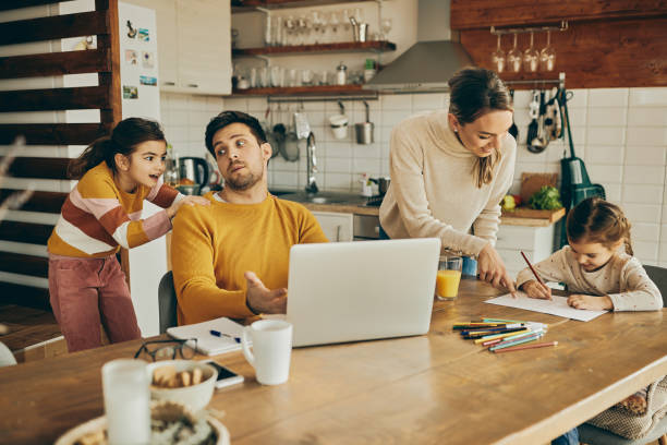 istock Multi-tasking family at home! 1307328038