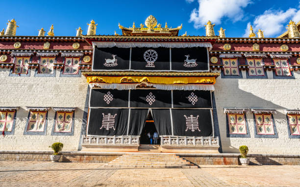 istock Songzanlin monastery main building facade view called Master Tsongkhapa hall and blue sky in Shangri-La Yunnan China 1307328880